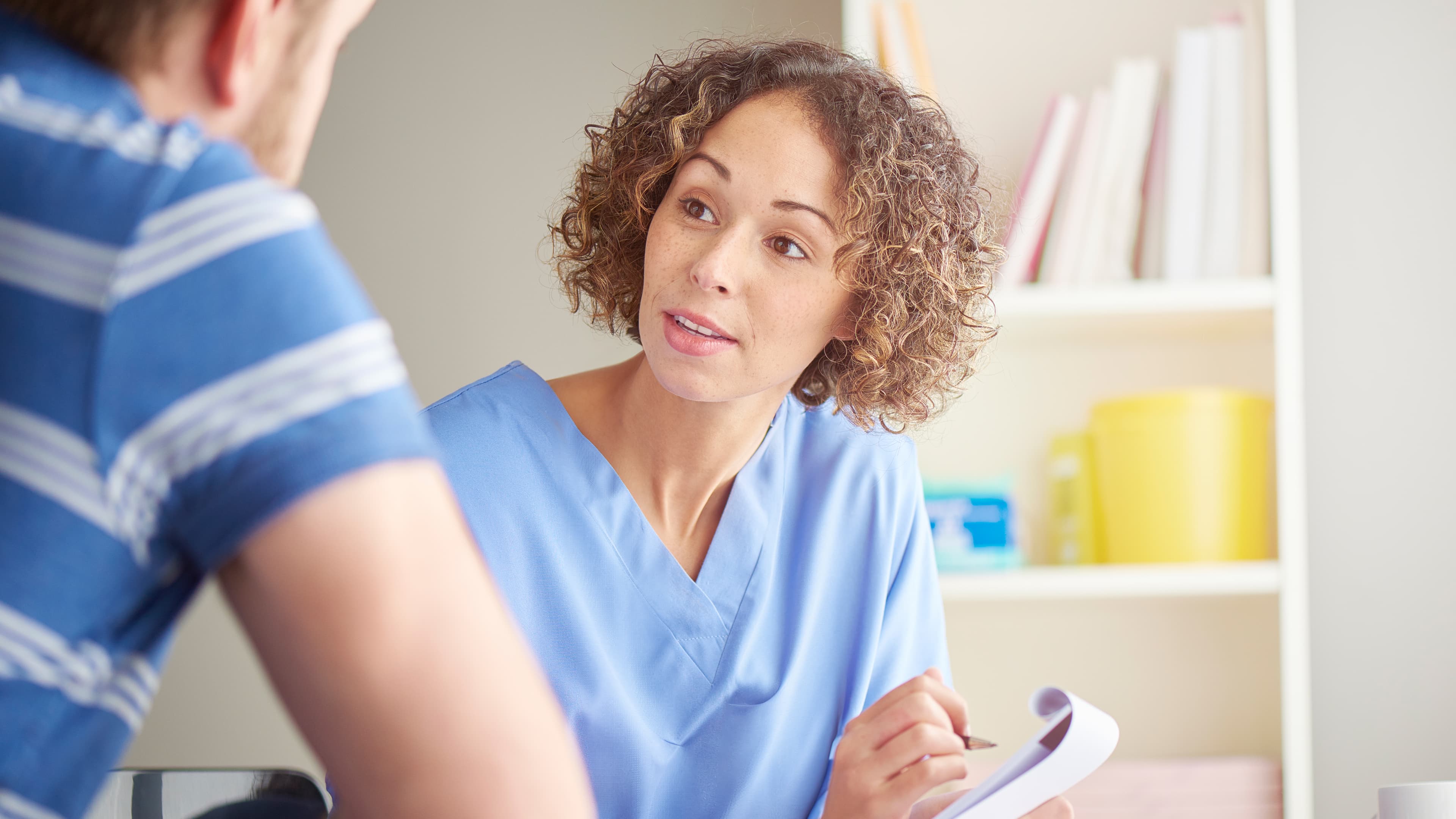 Female doctor with patient