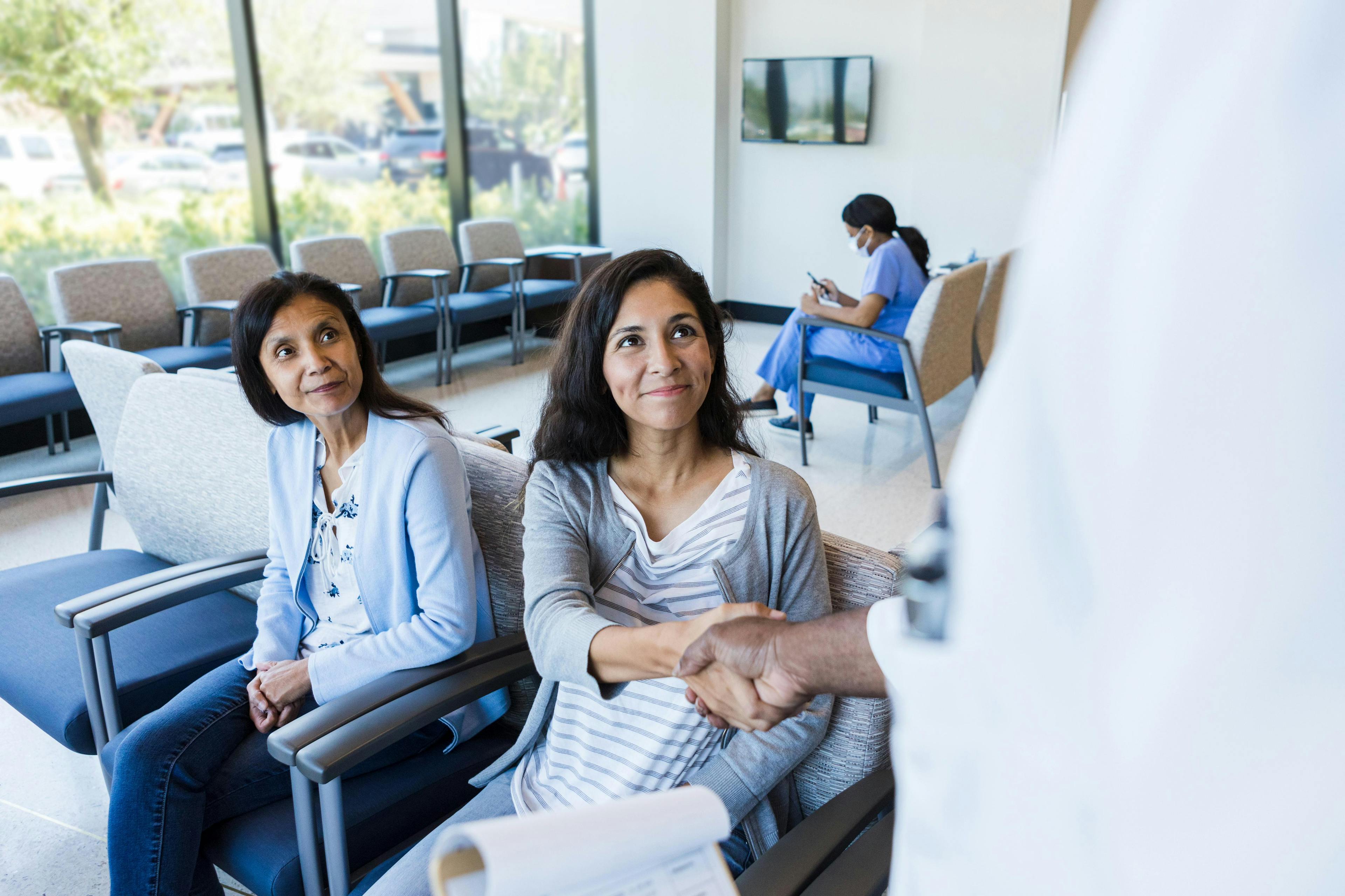 Patient greeted by doctor